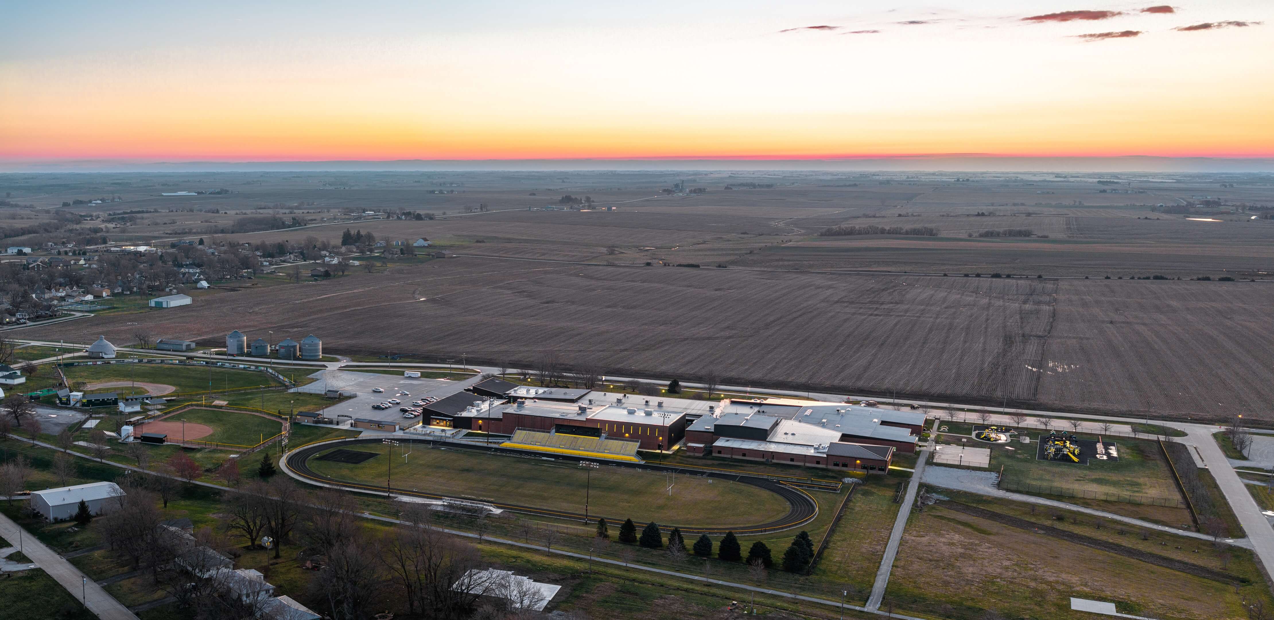 Aerial view of Lenox schools and the track in southwest Iowa at sunset